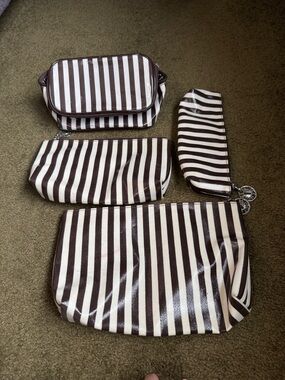 henri bendel Brown and White Striped Cosmetic Pouch Set